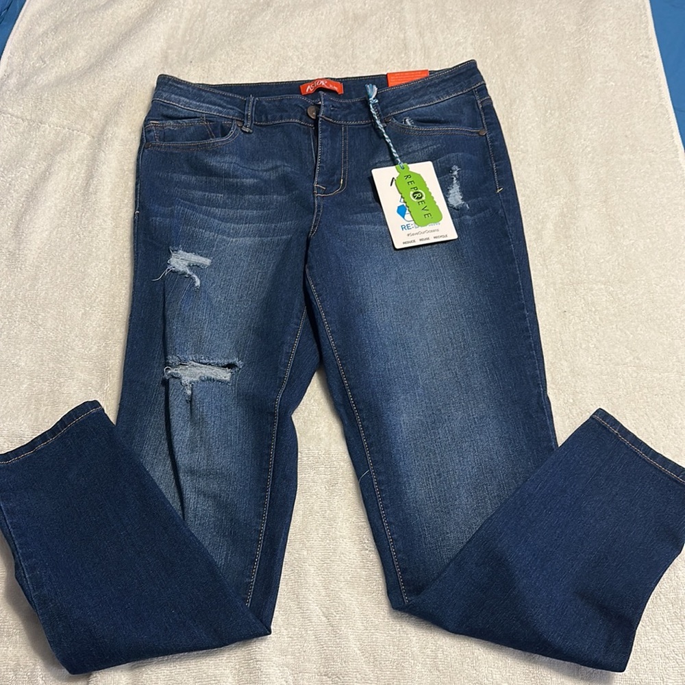 Distressed skinny jean.